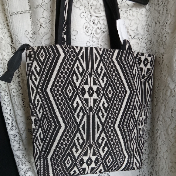 XLarge Tote Designed so well.13 Inches tall 16 across. - Picture 4 of 4
